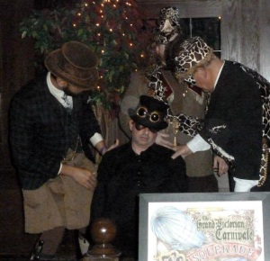 Murder! Gentleman Jack, Dr. Blacktongue, and Professor Ossicone attempt to revive poor Stuart. Photo by Brenda Havens.